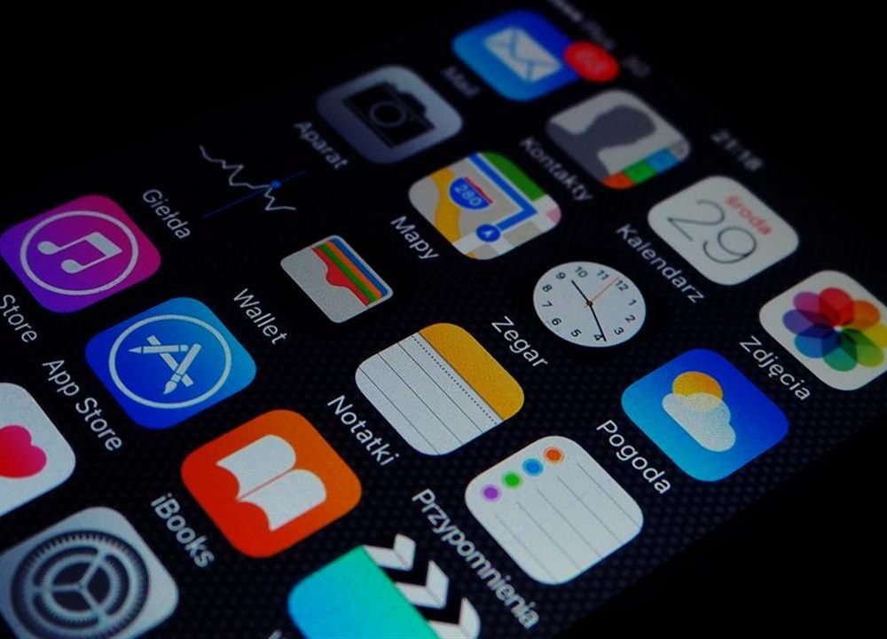 Smartphone home screen with a grid of mobile apps